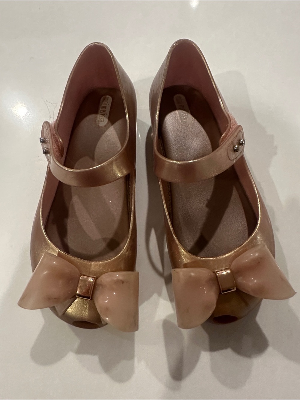 Mini Melissa Metallic Rose Gold Bow Mary Jane Shoes